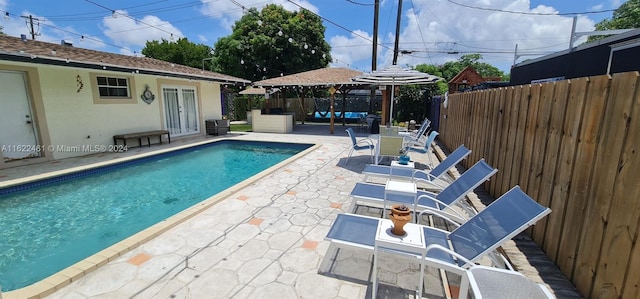 view of pool with a patio