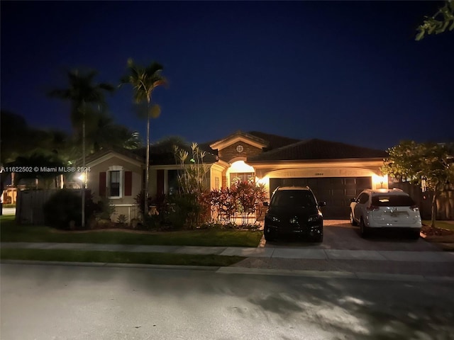 ranch-style home with a garage