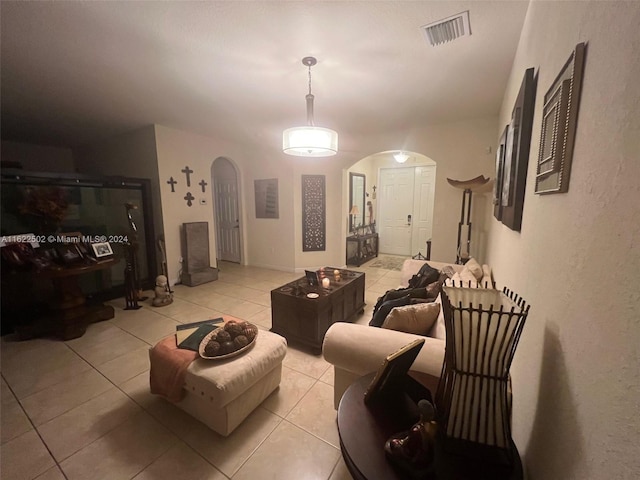 living room with light tile patterned floors