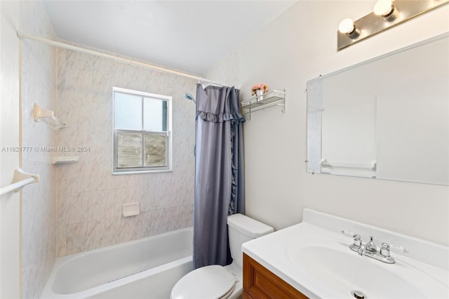 full bathroom with shower / bath combination with curtain, toilet, and vanity