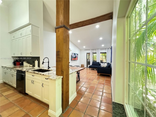 kitchen with dishwasher, sink, light stone countertops, white cabinetry, and tasteful backsplash