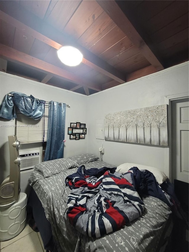 bedroom with tile patterned floors, beamed ceiling, and wooden ceiling