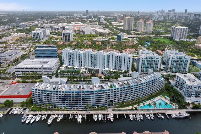 drone / aerial view featuring a water view and a view of city