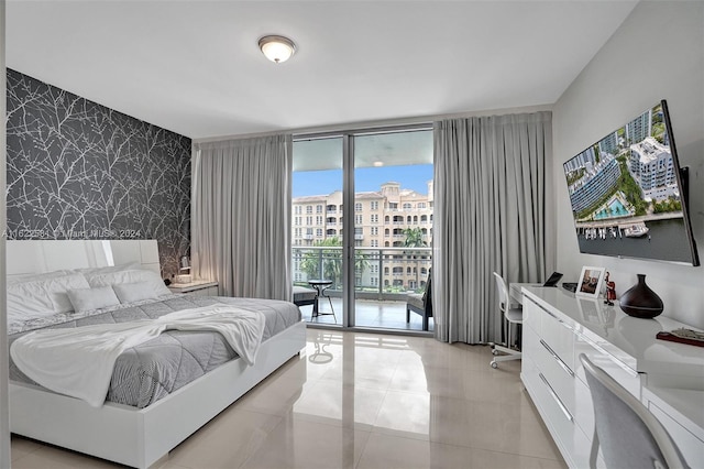 tiled bedroom with expansive windows and access to outside