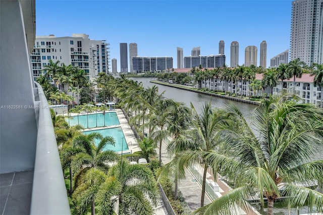 view of pool featuring a water view