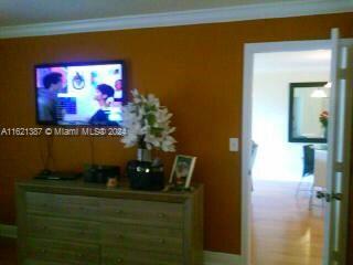 hallway with crown molding