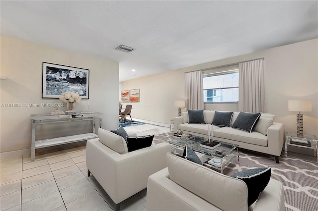 living room with light tile patterned floors