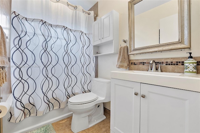 full bathroom featuring shower / tub combo, tile patterned flooring, vanity, and toilet