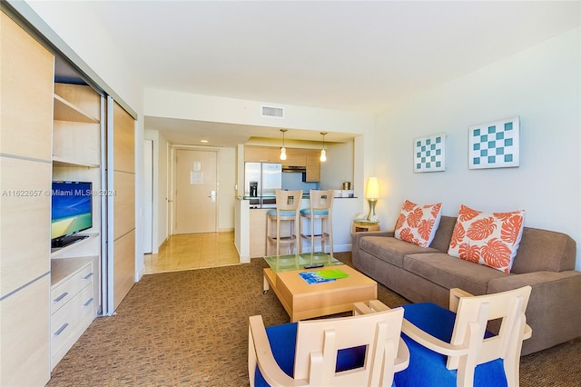 living room with light colored carpet