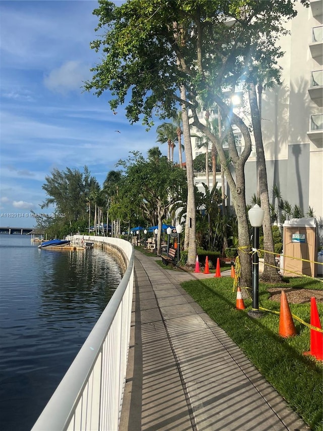 view of home's community with a water view