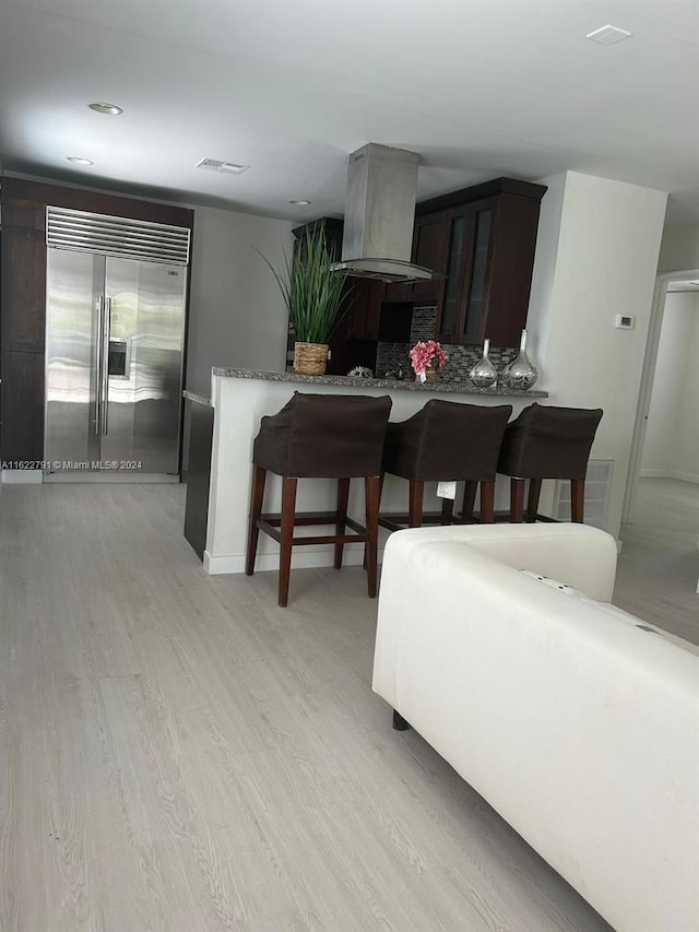 dining space with light wood-type flooring