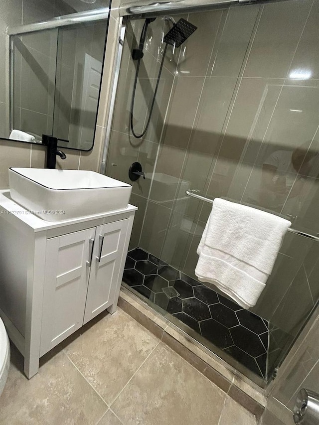 bathroom with vanity and an enclosed shower