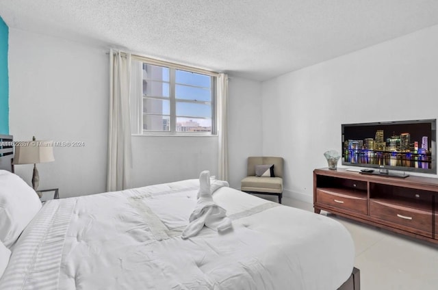 bedroom featuring a textured ceiling