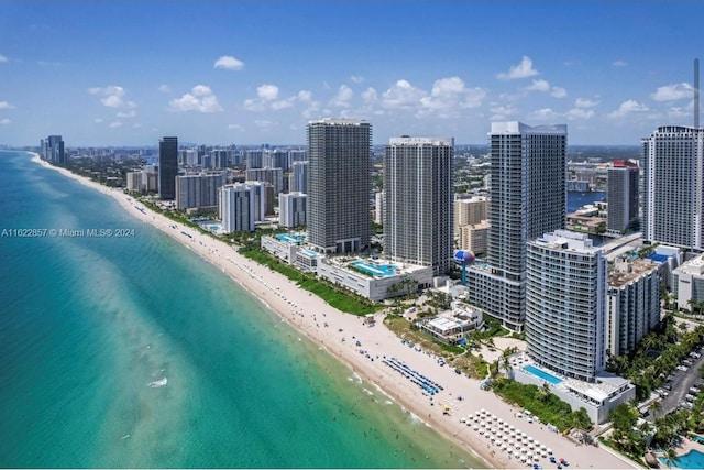 exterior space featuring a view of the beach and a water view