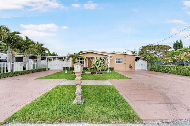 view of front of home with a front lawn