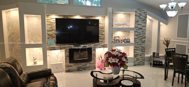 tiled living room featuring a fireplace and a notable chandelier