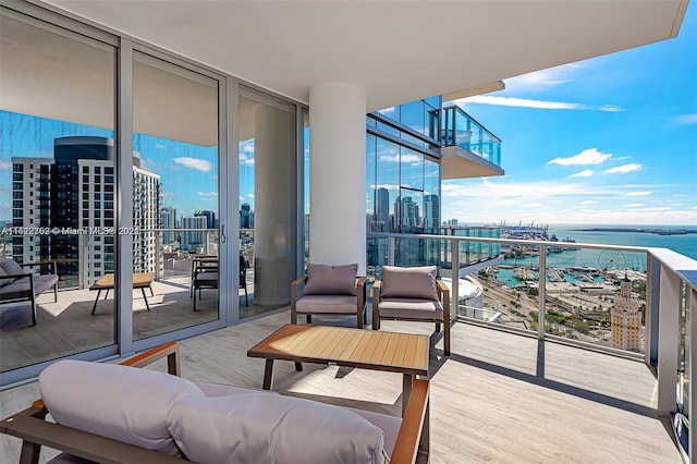 balcony featuring a water view