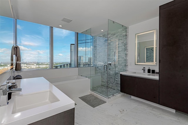 bathroom with vanity and plus walk in shower