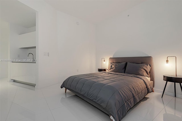 bedroom featuring light tile patterned floors