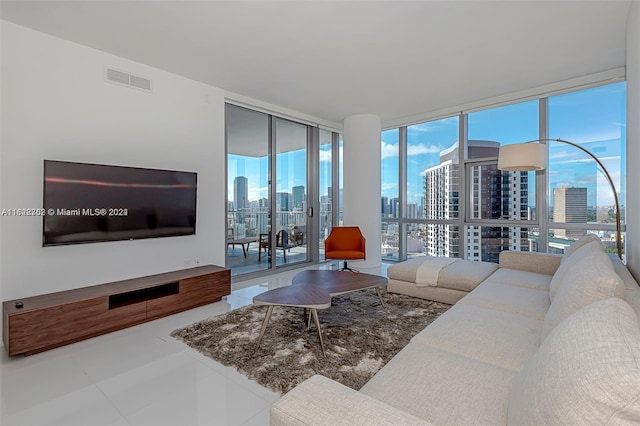 tiled living room with expansive windows