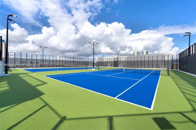 view of tennis court with basketball court