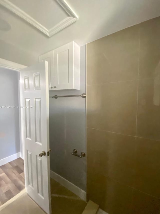 bathroom with wood-type flooring