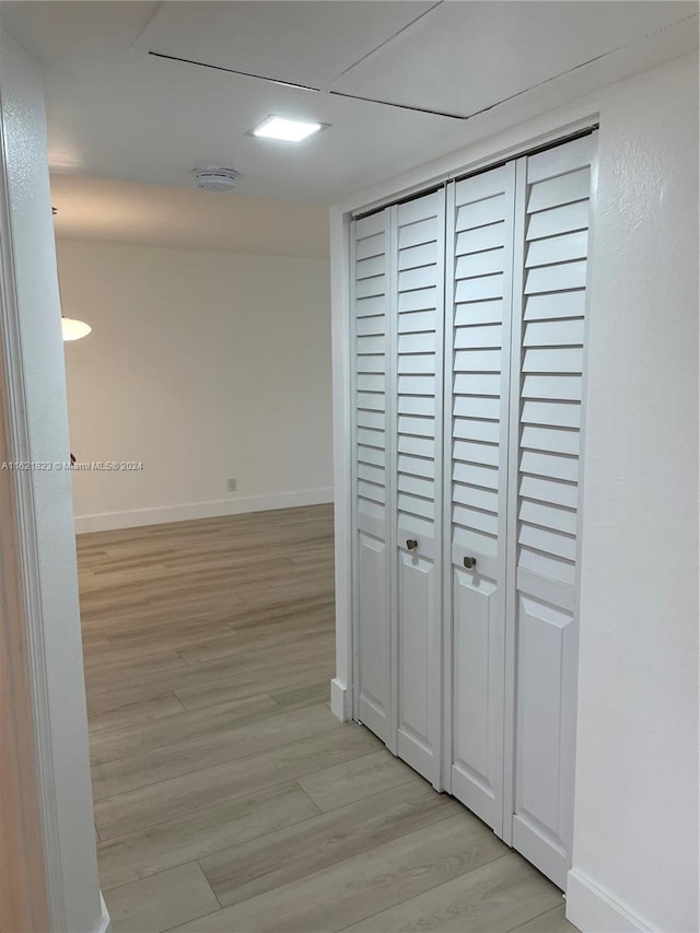 hallway featuring light hardwood / wood-style floors