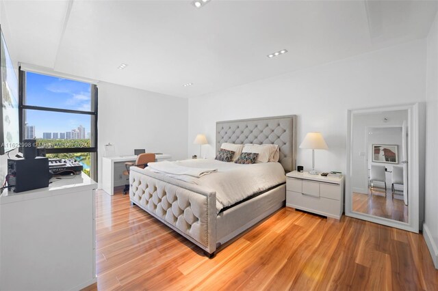 bedroom with light hardwood / wood-style flooring