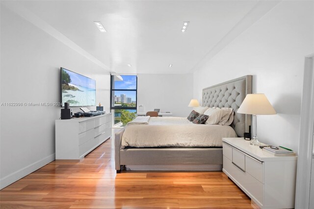 bedroom with light wood-type flooring