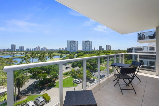 balcony featuring a water view