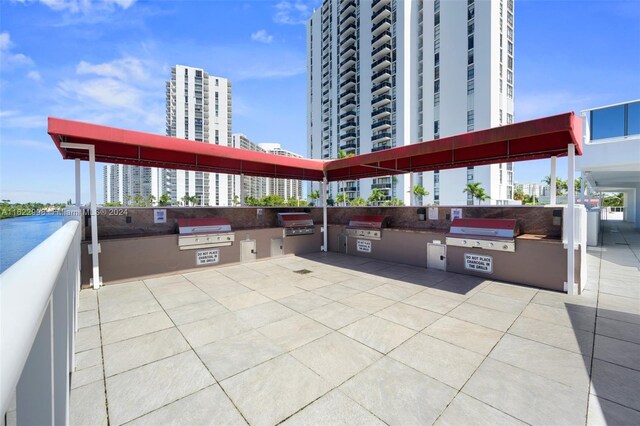 view of patio / terrace featuring an outdoor kitchen and grilling area