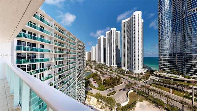 balcony featuring a water view