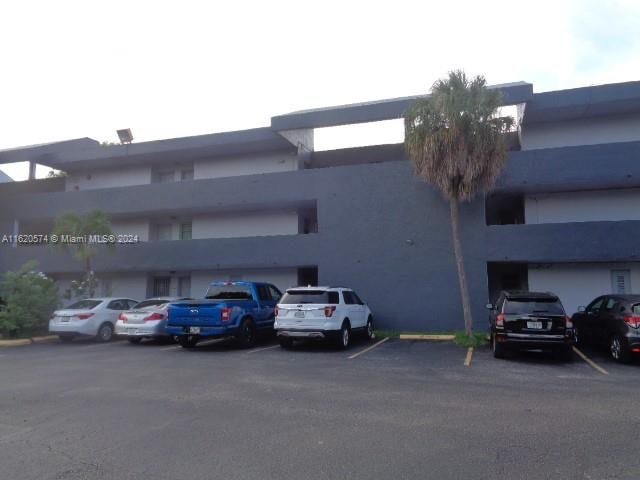 view of property featuring a garage