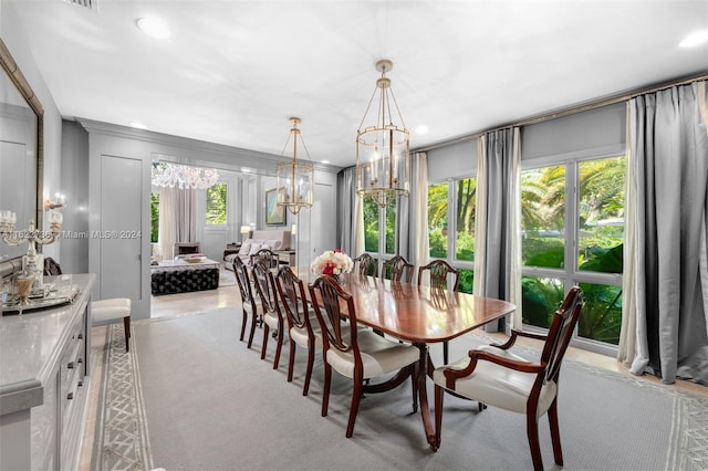 dining area with crown molding