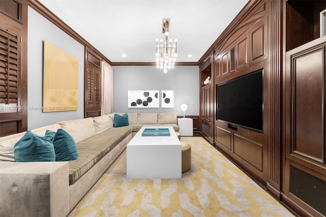 living room featuring a notable chandelier and ornamental molding