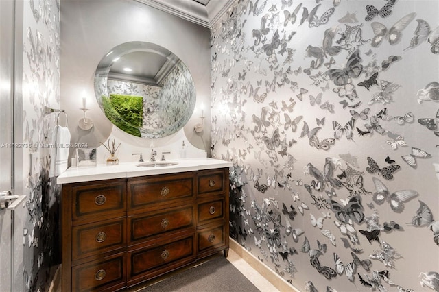 bathroom with vanity and crown molding