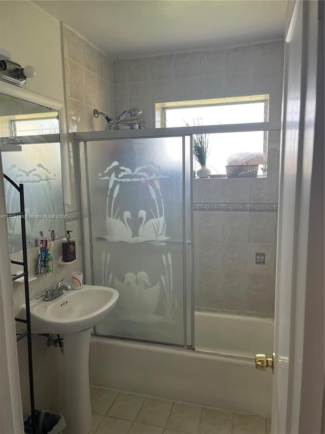 bathroom with tile patterned flooring and enclosed tub / shower combo