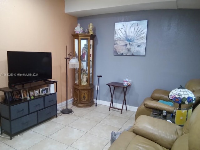 living room with light tile patterned flooring