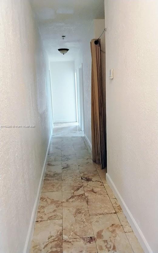 6474 SW 26th St, Miramar, FL 33023 - corridor featuring baseboards