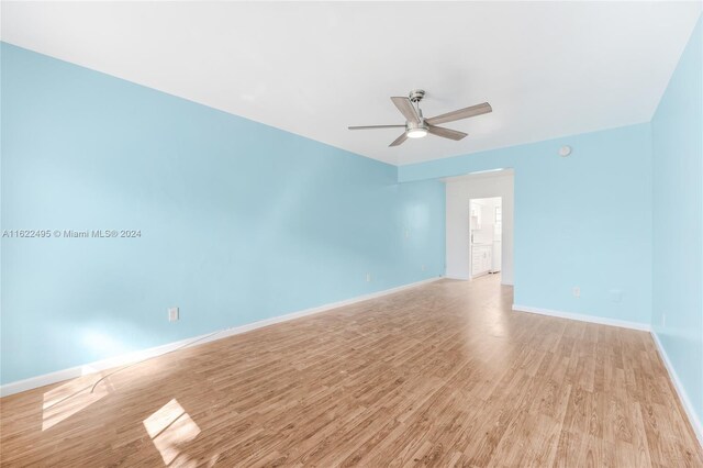 635 8th St Unit 205, Miami Beach, FL 33139 - spare room featuring ceiling fan and light wood-style flooring