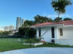 view of front of house with a front lawn