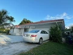 view of home's exterior with a garage