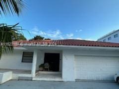 view of home's exterior featuring a garage