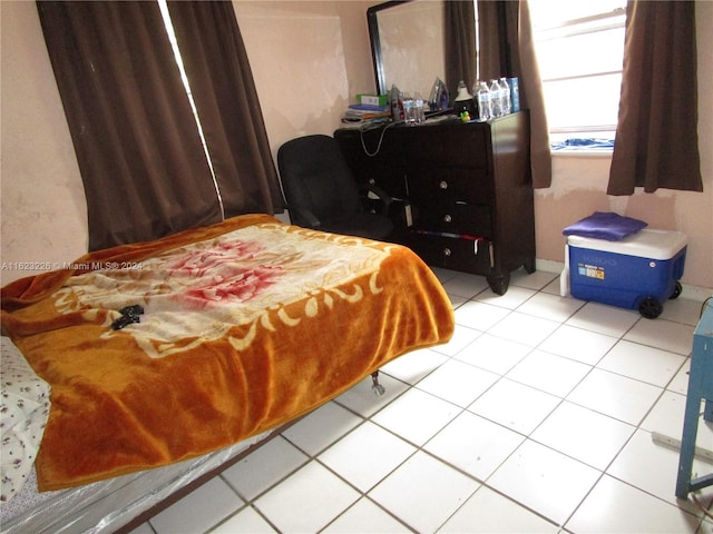 bedroom with tile patterned flooring