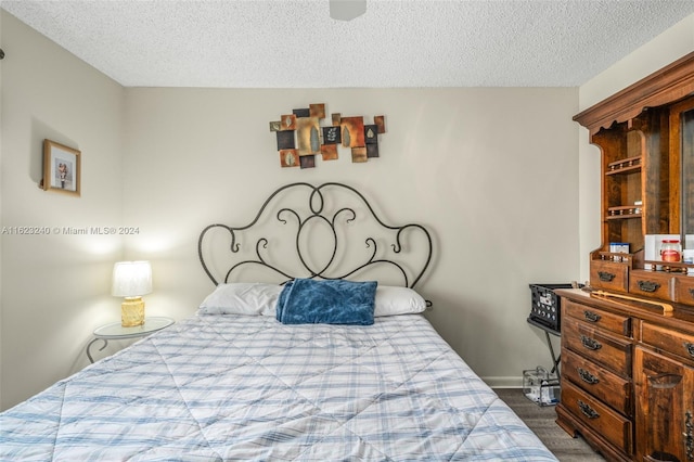 bedroom with a textured ceiling