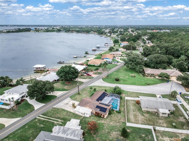 bird's eye view with a water view