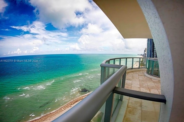 balcony with a water view and cooling unit