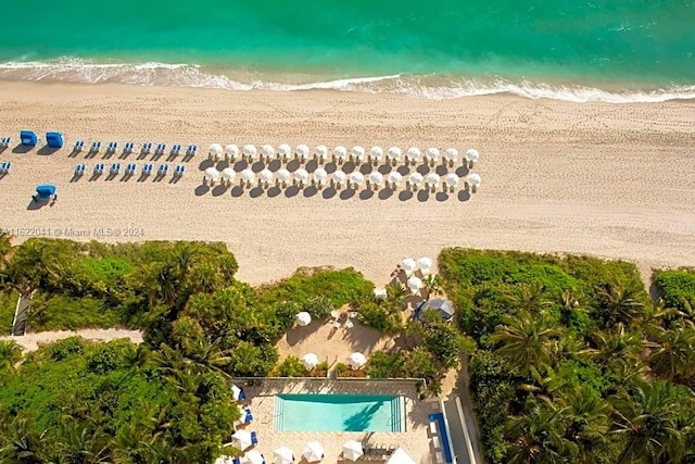 bird's eye view featuring a view of the beach