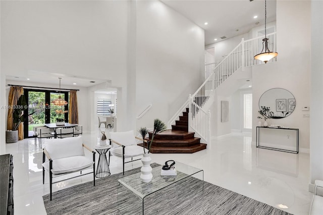 living room with a high ceiling