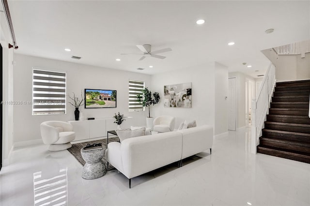 living room featuring ceiling fan